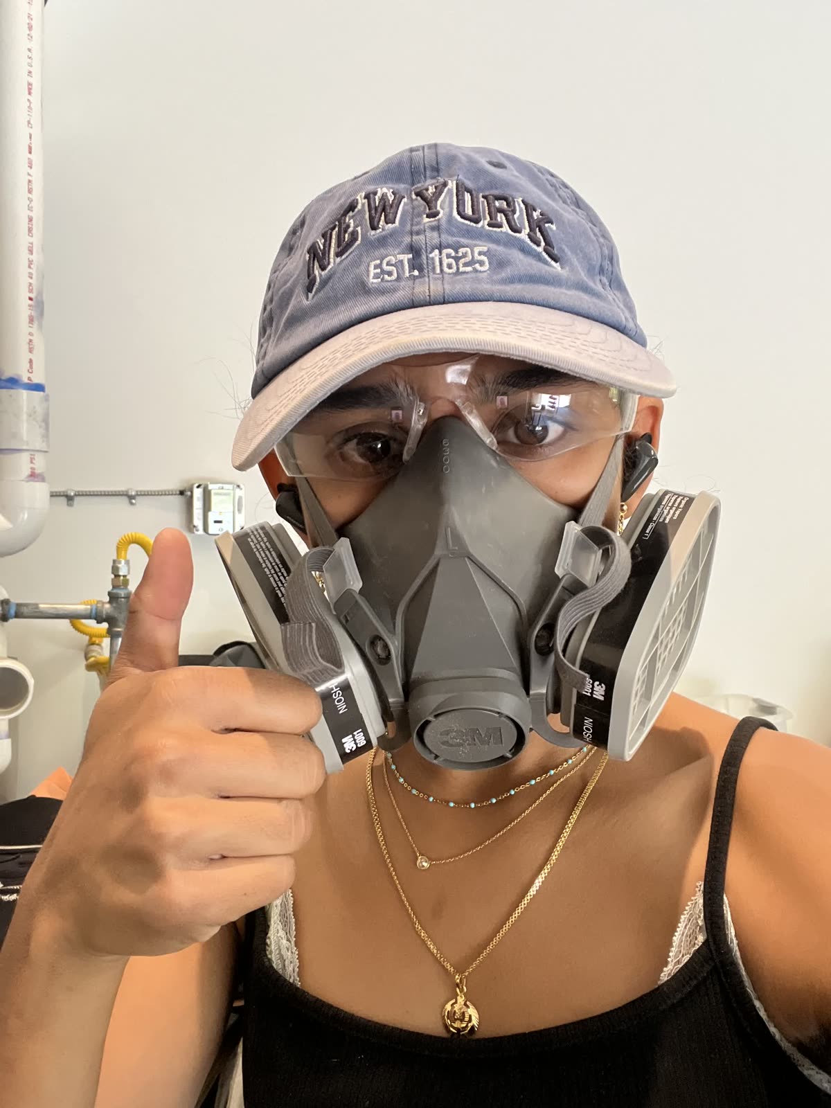 Shilpa in a ventilation mask while working